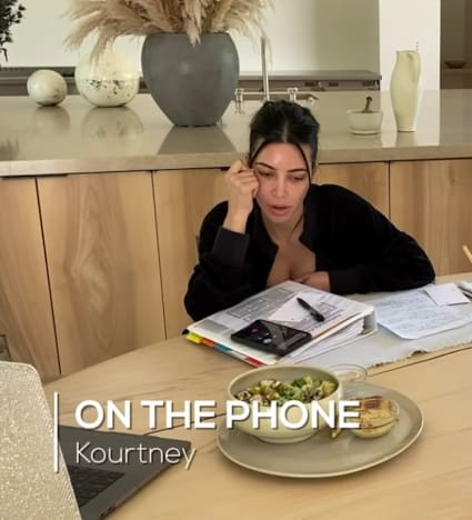 Kourtney with Kim on phone