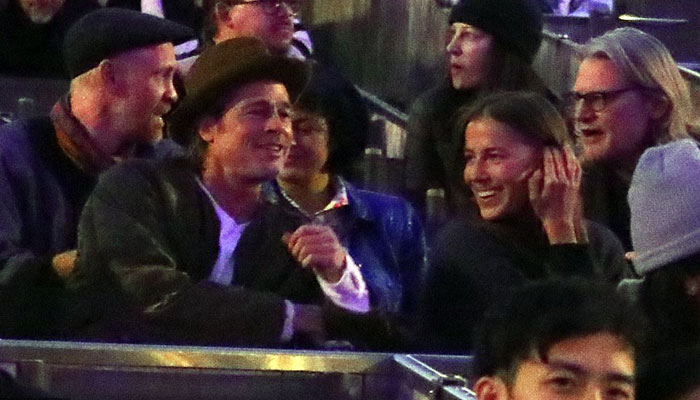 Brad Pitt adn Nicole Poturalski