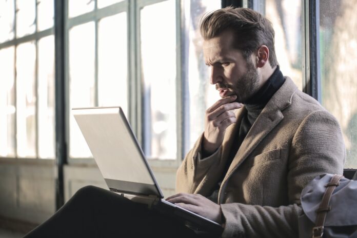 person sitting at a computer