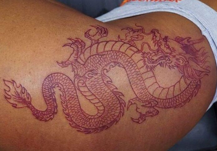 Dragon Thigh Tattoo